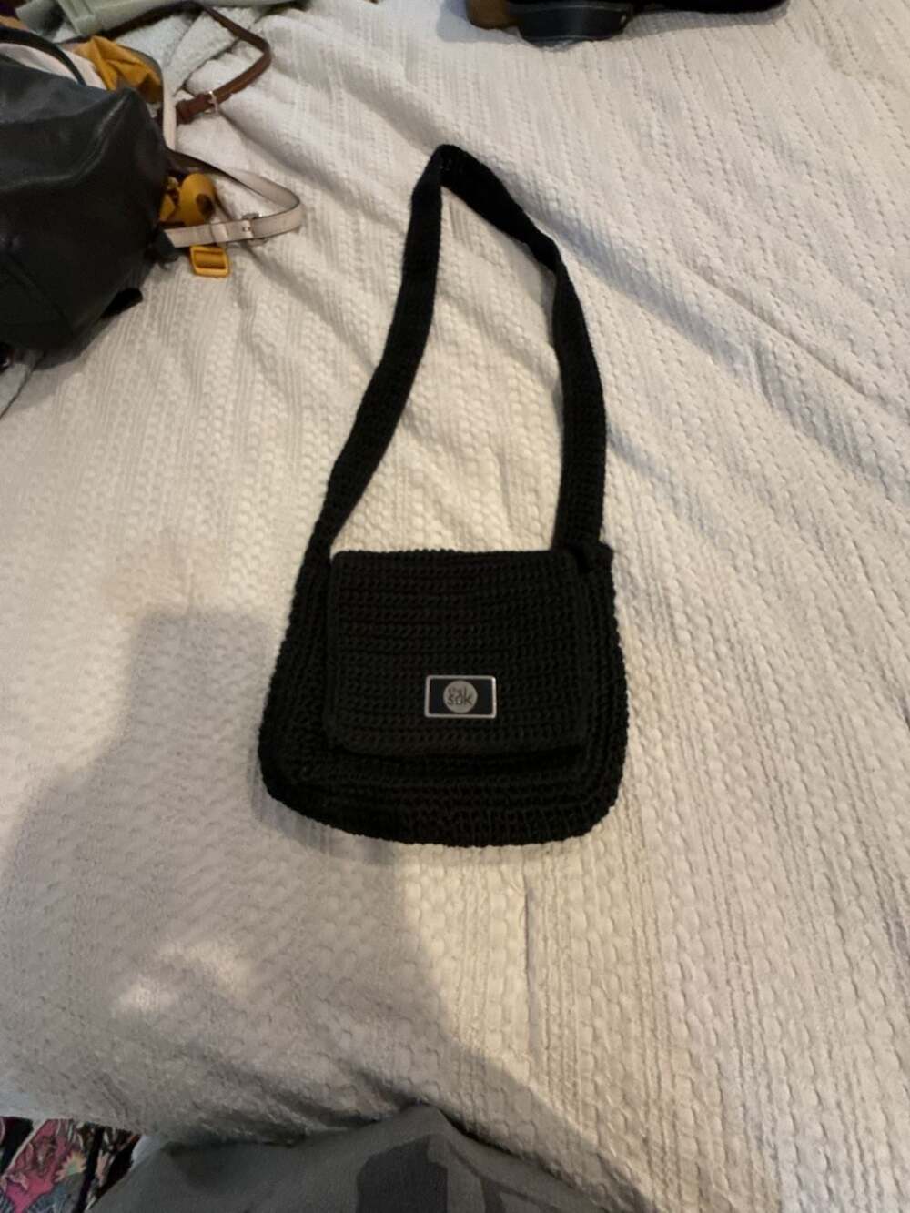 The Sak Small Black Crochet Knit Crossbody Flap Bag